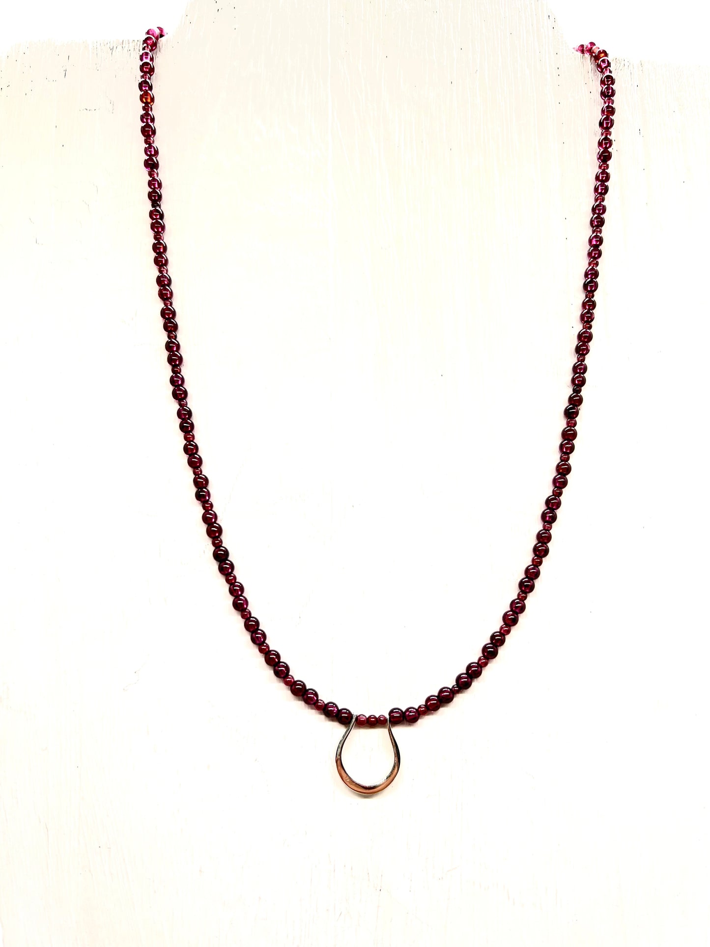 Horseshoe Pendant Necklace with Garnet